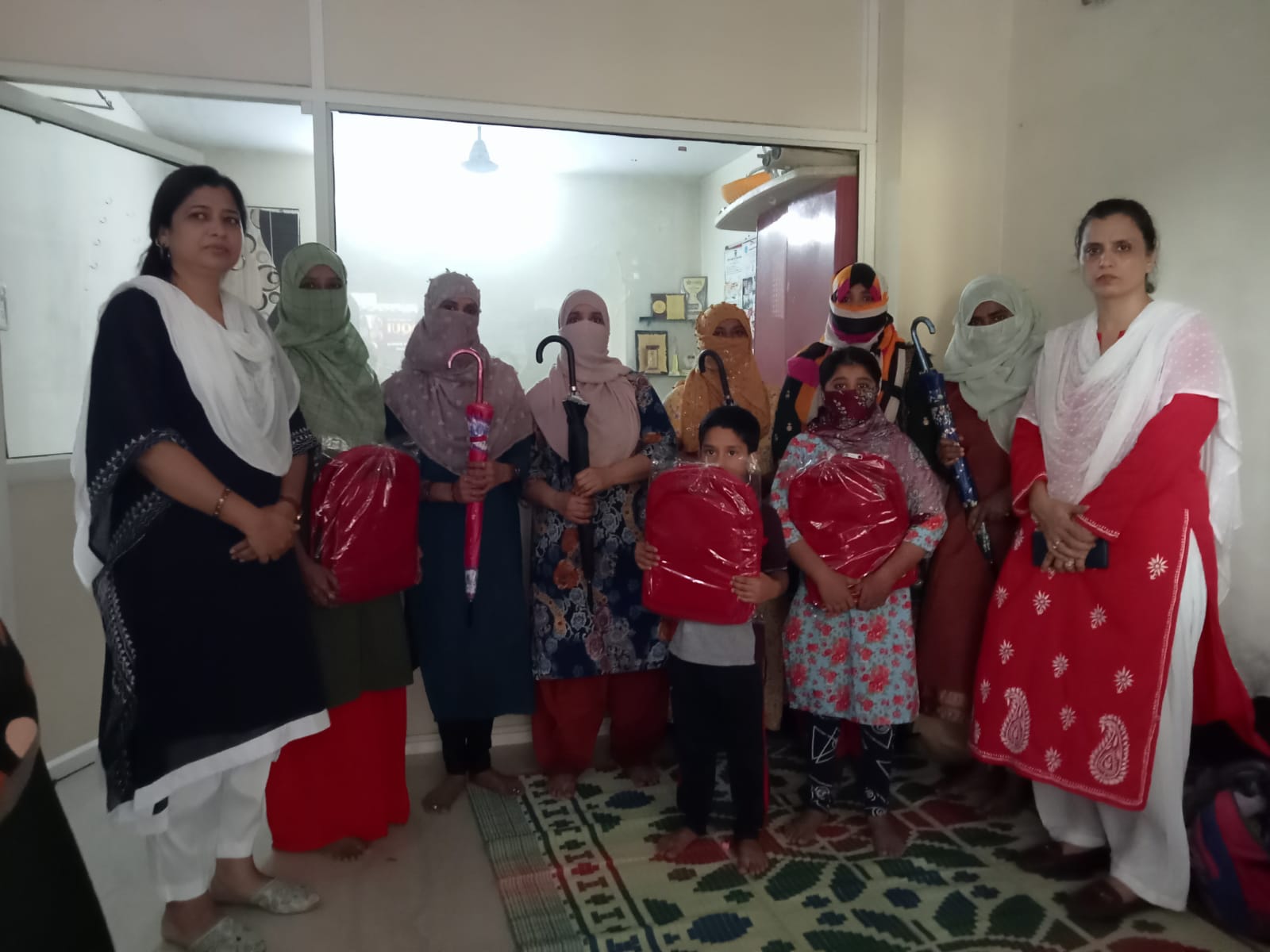 Umbrellas & School Bags for Slum School Children